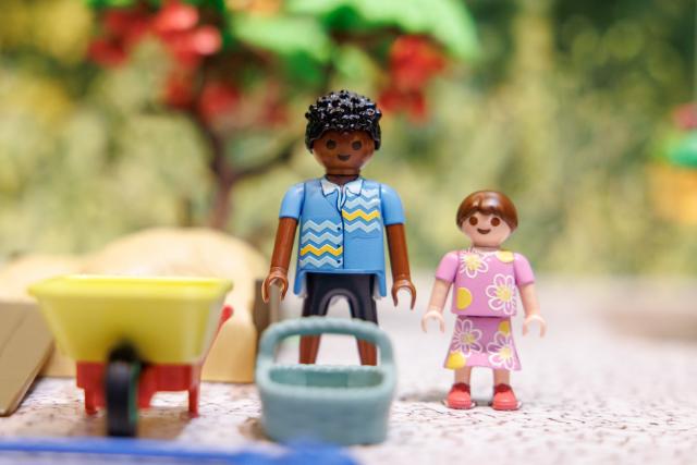 FILED - 29 January 2024, Bavaria, Nuremberg: FILE PHOTO - Two figures from Playmobil's Tiny House play world, which consists of more than 80 percent recycled and bio-based materials on average, are on display at the Playmobil stand in the run-up to the International Toy Fair. Photo: Daniel Karmann/dpa