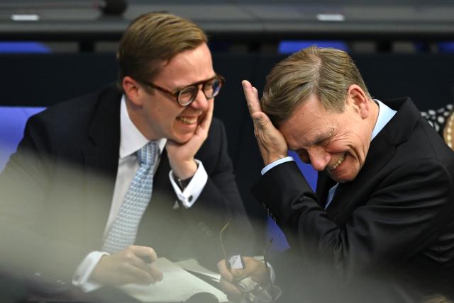 25 June 2026, Berlin: Johann Wadephul (R), Germany's Foreign Minister, speaks with and Philipp Amthor (L) during a plenary session of the German Bundestag. Photo: Elisa Schu/dpa