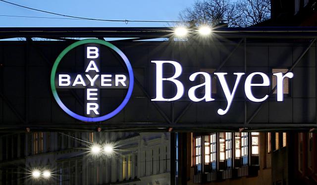 FILED - 07 February 2019, North Rhine-Westphalia, Wuppertal: FILE PHOTO - The logo of the German pharmaceutical giant Bayer shines in Wuppertal. Photo: Oliver Berg/dpa