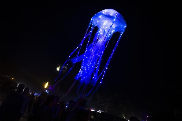 25 June 2026, Mecklenburg-Western Pomerania, Laerz: A view of a light installation at the Fusion Festival, the largest alternative music and cultural festivals in Europe. The event was interrupted due to fires near the Fusion Festival. After an interruption lasting about two hours, visitors were allowed back onto the grounds. Photo: Philip Dulian/dpa