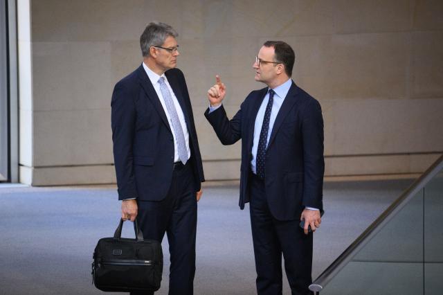 26 June 2026, Berlin: German Minister of Transportation Patrick Schnieder (L) and CDU/CSU parliamentary group chairman Jens Spahn (R) speak prior to the start of the 87th plenary session of the 21st legislative period at the German Bundestag. Photo: Bernd von Jutrczenka/dpa