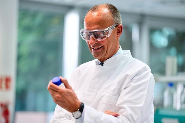 26 June 2026, Saxony-Anhalt, Barleben: German Chancellor Friedrich Merz visits the Salutas Pharma pharmaceutical company. Photo: Matthias Schrader/Pool AP/AP Photo/Matthias Schrader