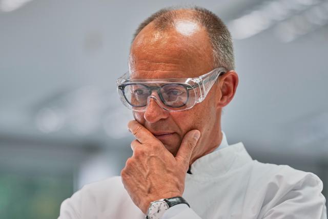 26 June 2026, Saxony-Anhalt, Barleben: German Chancellor Friedrich Merz visits the Salutas Pharma pharmaceutical company. Photo: Matthias Schrader/Pool AP/AP Photo/Matthias Schrader
