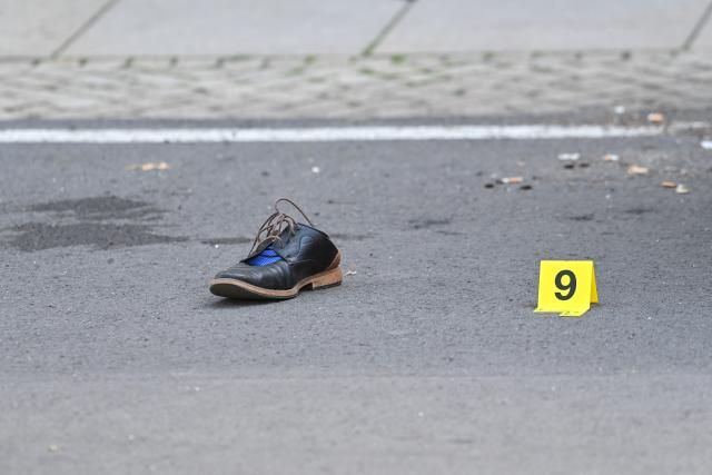 26 June 2026, Saxony-Anhalt, Haldensleben: A forensic marker is at the crime scene on the edge of the market square as police conduct an operation following an incident in which at least one person was injured, according to the Magdeburg Police Department. Photo: Klaus-Dietmar Gabbert/dpa