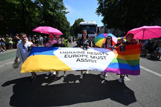 27 June 2026, Bavaria, Munich: Participants take part in the PolitParade at CSD Munich 2026. This year, CSD Munich will take place from June 26 to 28, 2026, as part of Pride Weeks, under the theme "Our Diversity. Our Strength." Photo: Felix Hörhager/dpa