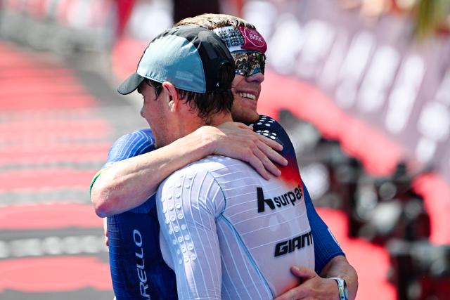 28 June 2026, Hesse, Frankfurt am Main: Mainova IRONMAN Frankfurt European Championship winner Casper Stornes (R) and runner-up Gustav Iden (L), both from Norway, celebrate together in the finish area. Photo: Uwe Anspach/dpa