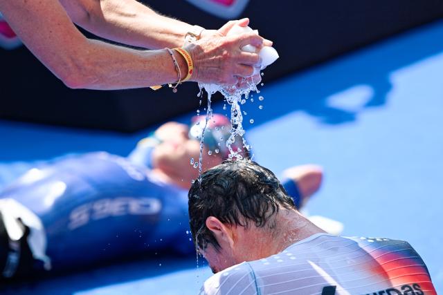 28 June 2026, Hesse, Frankfurt am Main: Mainova IRONMAN Frankfurt European Championship winner Casper Stornes (R) and runner-up Gustav Iden (L), both from Norway, celebrate together in the finish area. Photo: Uwe Anspach/dpa