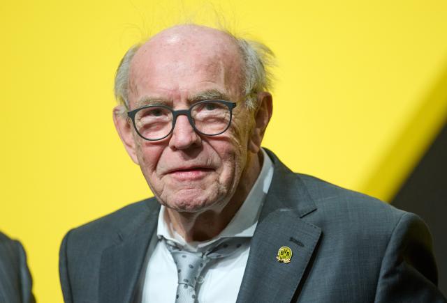 FILED - 24 November 2024, North Rhine-Westphalia, Dortmund: FILE PHOTO - Wolfgang Paul, club legend and former BVB player, is honored as honorary captain during the Borussia Dortmund General Meeting. Paul has died at the age of 86. Photo: Bernd Thissen/dpa