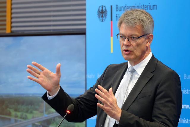 FILED - 19 June 2026, North Rhine-Westphalia, Bonn: FILE PHOTO - German Transportation Minister Patrick Schnieder speaks at a press conference in Bonn regarding the closed North Bridge. Photo: Henning Kaiser/dpa