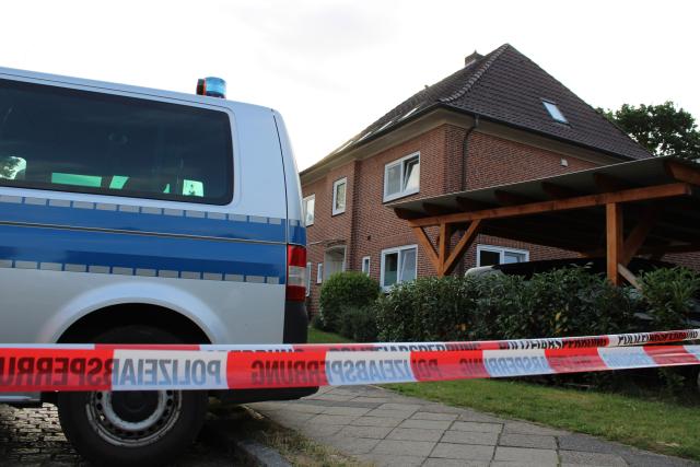 30 June 2026, Lower Saxony, Stade: A police car is parked near a building that houses a youth facility. Several people were killed in a shooting at the facility yesterday. Photo: Kai Moorschlatt/dpa