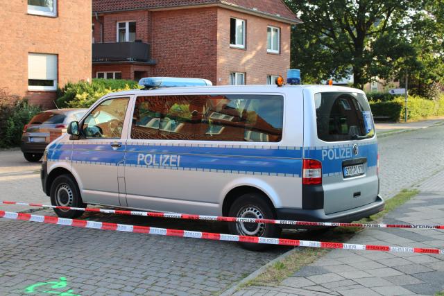 30 June 2026, Lower Saxony, Stade: A police car is parked outside a youth facility. Several people were killed in a shooting at the facility yesterday. Photo: Kai Moorschlatt/dpa