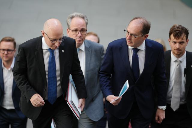30 June 2026, Berlin: Alexander Dobrindt (2-R), German Minister of the Interior, and Sinan Selen (L), President of the Federal Office for the Protection of the Constitution (BfV), attend the presentation of the 2025 Report on the Protection of the Constitution. Photo: Kay Nietfeld/dpa