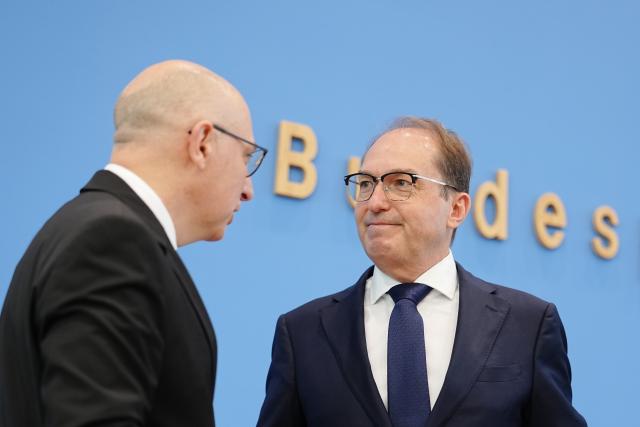 30 June 2026, Berlin: Alexander Dobrindt (R), German Minister of the Interior, and Sinan Selen, President of the Federal Office for the Protection of the Constitution (BfV), present the 2025 Report on the Protection of the Constitution. Photo: Kay Nietfeld/dpa