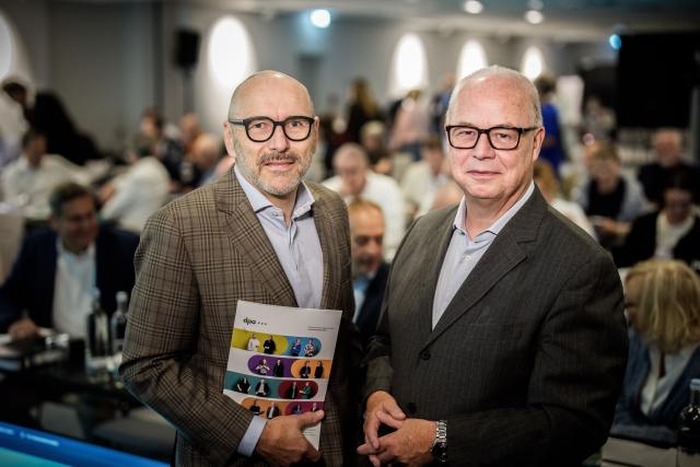 30 June 2026, Hamburg: Peter Kropsch (L), Chairman of the Executive Board of the German Press Agency (DPA), and Sven Gösmann, DPA Editor-in-Chief, are photographed before the start of the DPA shareholders' meeting, during which dpa's financial results for 2025 were announced. Photo: Michael Kappeler/dpa