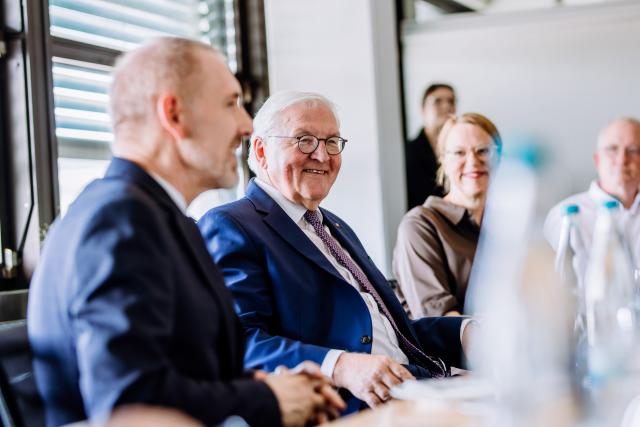 30 June 2026, Baden-Württemberg, Lörrach: German President Frank-Walter Steinmeier (C) sits next to Mayor Joerg Lutz (L) during a discussion on local politics at the City Hall in Loerrach. For three days, Steinmeier will conduct his official duties from this city in the "Three-Country Corner," very close to Switzerland and France, as part of his "Local Time Germany" tour, where he leaves his official residence in Berlin to visit regions outside the major cities in order to engage in conversation with local residents. Photo: Philipp von Ditfurth/dpa