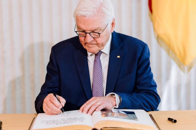 30 June 2026, Baden-Württemberg, Lörrach: German President Frank-Walter Steinmeier signs the Golden Book of the city of Loerrach. For three days, Steinmeier will conduct his official duties from this city in the "Three-Country Corner," very close to Switzerland and France, as part of his 
"Local Time Germany" tour, where he leaves his official residence in Berlin to visit regions outside the major cities in order to engage in conversation with local residents. Photo: Philipp von Ditfurth/dpa