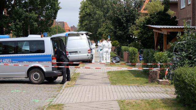 30 June 2026, Lower Saxony, Stade: Forensic specialists collect evidence at the scene of a fatal shooting at a youth facility. Several people were shot dead at the facility the previous day. Photo: Jörn Hüneke/dpa