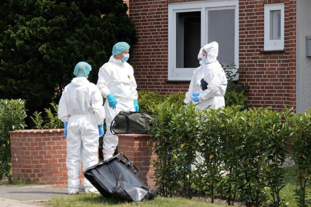 30 June 2026, Lower Saxony, Stade: Forensic specialists collect evidence at the scene of a fatal shooting at a youth facility. Several people were shot dead at the facility the previous day. Photo: Jörn Hüneke/dpa