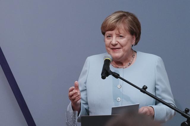 30 June 2026, Berlin: Former German chancellor Angela Merkel speaks during the unveiling of her portrait for the Hall of Ancestors at the Federal Chancellery. The portrait will be on display at the Bode Museum until October 4, 2026, before being moved to the Federal Chancellery. Photo: Kay Nietfeld/dpa