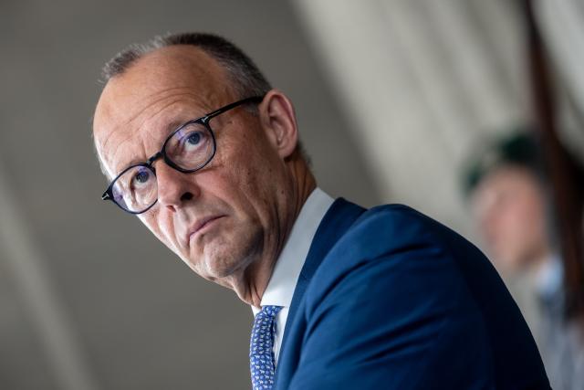 01 July 2026, Berlin: German Chancellor Friedrich Merz waits at the Ministry of Defense for NATO Secretary Rutte to arrive ahead of the German Cabinet meeting. Photo: Michael Kappeler/dpa POOL/dpa