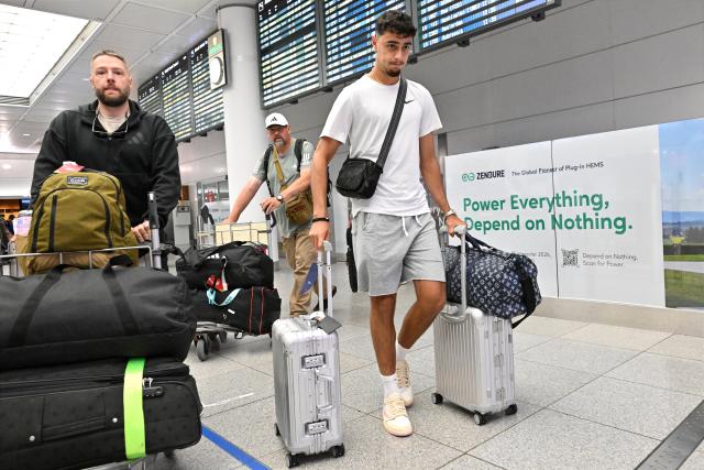 01 July 2026, Bavaria, Munich: Germany's Aleksandar Pavlovic arrives at Munich Airport, after the 2026 FIFA World Cup round of 32 soccer match against Paraguay, that resulted in the elimination of Germany. Photo: Peter Kneffel/dpa