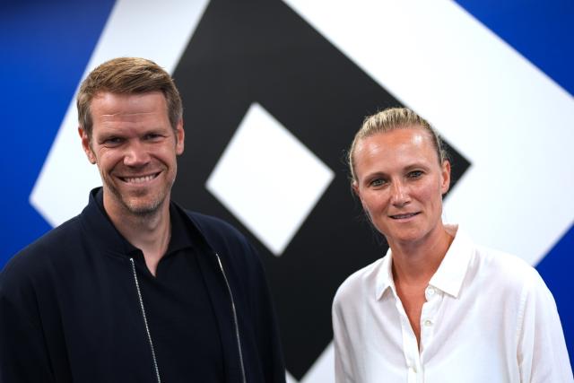 01 July 2026, Hamburg: Kathleen Krueger, the new Chief Sports Officer of Hamburger SV, stands next to Eric Huwer, Chief Financial and Organisational Officer of Hamburger SV, during her introductory press conference at the Volksparkstadion. Photo: Marcus Brandt/dpa - WICHTIGER HINWEIS: Gemäß den Vorgaben der DFL Deutsche Fußball Liga bzw. des DFB Deutscher Fußball-Bund ist es untersagt, in dem Stadion und/oder vom Spiel angefertigte Fotoaufnahmen in Form von Sequenzbildern und/oder videoähnlichen Fotostrecken zu verwerten bzw. verwerten zu lassen.