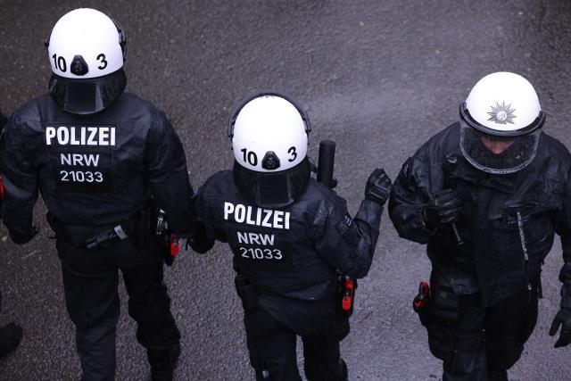 FILED - 16 April 2024, North Rhine-Westphalia, Wuppertal: FILE PHOTO - Police officers stand during a major exercise by the Wuppertal police. Photo: David Young/dpa