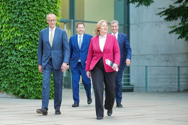 02 July 2026, Berlin: (L-R) German Chancellor Friedrich Merz, German Minister of Finance Lars Klingbeil, German Minister of Labor and Social Affairs Baerbel Bas and Markus Soeder, Minister-President of Bavaria and Christian Social Union (CSU) Chairman, arrive to the press conference following the coalition committee meeting at the German Chancellery. Leaders of the Christian Democratic Union (CDU)/CSU and Social Democratic Party (SPD) present the government's reform plans. Photo: Michael Kappeler/dpa
