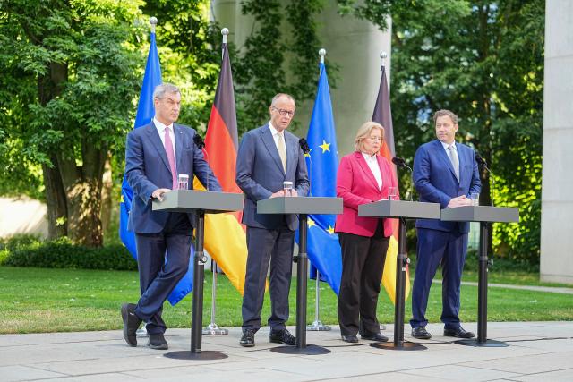 02 July 2026, Berlin: (L-R) Markus Soeder, Minister-President of Bavaria and Christian Social Union (CSU) Chairman, German Chancellor Friedrich Merz,  German Minister of Labor and Social Affairs Baerbel Bas and German Minister of Finance Lars Klingbeil, hold a joint press conference following the coalition committee meeting at the German Chancellery. Leaders of the Christian Democratic Union (CDU)/CSU and Social Democratic Party (SPD) present the government's reform plans. Photo: Michael Kappeler/dpa