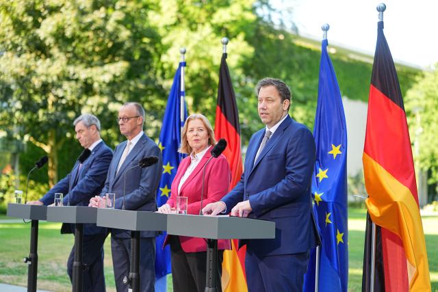 02 July 2026, Berlin: (L-R) Markus Soeder, Minister-President of Bavaria and Christian Social Union (CSU) Chairman, German Chancellor Friedrich Merz,  German Minister of Labor and Social Affairs Baerbel Bas and German Minister of Finance Lars Klingbeil, hold a joint press conference following the coalition committee meeting at the German Chancellery. Leaders of the Christian Democratic Union (CDU)/CSU and Social Democratic Party (SPD) present the government's reform plans. Photo: Michael Kappeler/dpa