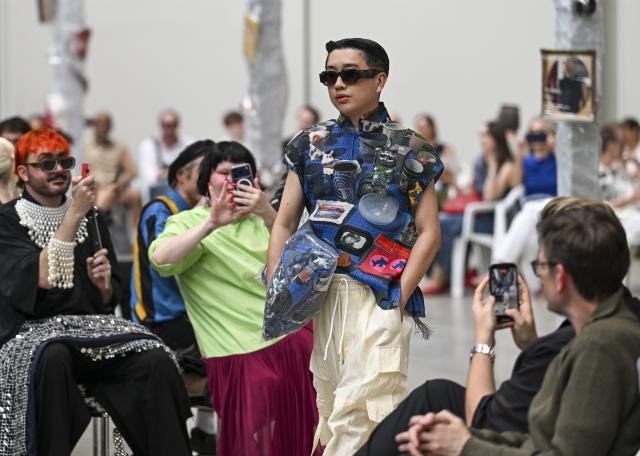 02 July 2026, Berlin: A model showcases a creation by designer William Fan at Berlin Fashion Week in the Wilhelm Hallen. Photo: Jens Kalaene/dpa