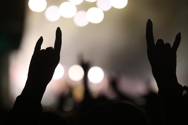 02 July 2026, Saxony-Anhalt, Ballenstedt: Visitors attend the Rockharz Festival in Ballenstedt. The largest rock festival in the Harz Mountains attracts around 25,000 visitors. Numerous bands perform at Rockharz over the course of four days. Photo: Matthias Bein/dpa