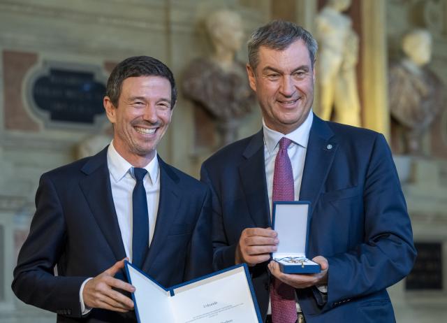 03 July 2026, Bavaria, Munich: Film Producer Oliver Berben (L), is presented with the Bavarian Order of Merit by Markus Soeder, Minister-President of Bavaria. The Bavarian Order of Merit is awarded "as a token of honor and gratitude for outstanding service to the Free State of Bavaria and the Bavarian people." Photo: Peter Kneffel/dpa