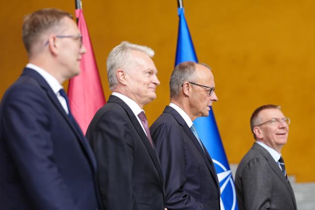 03 July 2026, Berlin: (L-R) Kristen Michal, Prime Minister of Estonia; Gitanas Nauseda, President of Lithuania, German Chancellor Friedrich Merz and and Edgars Rinkevics, President of Latvia, pose for a photo ahead of the Baltic Heads of State and Government meeting on preparations for the NATO summit in Ankara, security and defense policy, and continued support for Ukraine. Photo: Kay Nietfeld/dpa