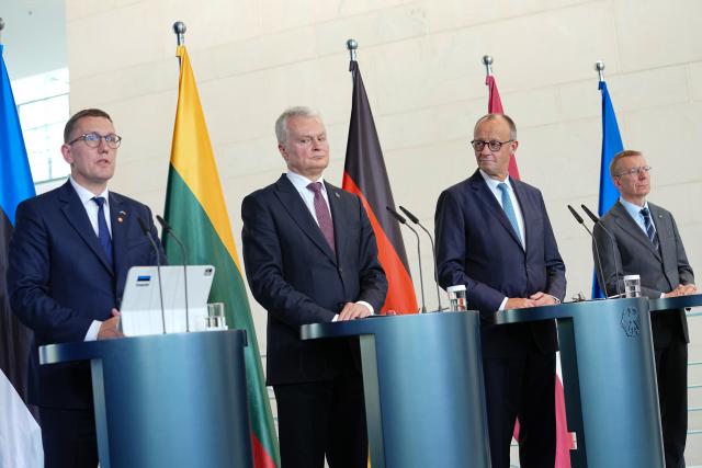 03 July 2026, Berlin: (L-R) Kristen Michal, Prime Minister of Estonia; Gitanas Nauseda, President of Lithuania, German Chancellor Friedrich Merz and and Edgars Rinkevics, President of Latvia, hold  ajoint press conference following the Baltic Heads of State and Government meeting on preparations for the NATO summit in Ankara, security and defense policy, and continued support for Ukraine. Photo: Kay Nietfeld/dpa