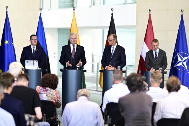 03 July 2026, Berlin: (L-R) Kristen Michal, Prime Minister of Estonia; Gitanas Nauseda, President of Lithuania, German Chancellor Friedrich Merz and and Edgars Rinkevics, President of Latvia, hold  ajoint press conference following the Baltic Heads of State and Government meeting on preparations for the NATO summit in Ankara, security and defense policy, and continued support for Ukraine. Photo: Fabian Sommer/dpa
