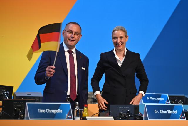 04 July 2026, Thuringia, Erfurt: Alice Weidel, federal chairwoman and parliamentary group leader of the Alternative for Germany (AfD), and Tino Chrupalla, chairman of the AfD's Bundestag parliamentary group, attend the AfD's federal party convention. The party's leadership is set to be re-elected at the convention. The AfD's national party convention will take place on July 4 and 5 at the Erfurt Exhibition Center. Photo: Katharina Kausche/dpa