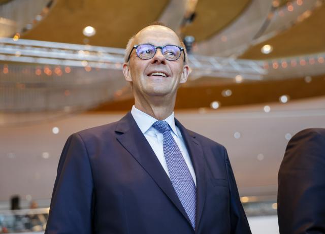04 July 2026, North Rhine-Westphalia, Duesseldorf: German Chancellor Friedrich Merz (L) arrives to the Christian Democratic Union (CDU) North Rhine-Westphalia state party convention. Photo: Thomas Banneyer/dpa