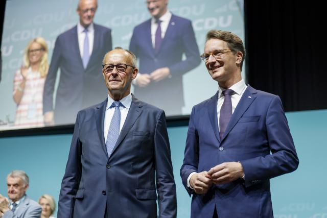 04 July 2026, North Rhine-Westphalia, Duesseldorf: German Chancellor Friedrich Merz and Hendrik Wuest, Minister President of North Rhine-Westphalia attend the Christian Democratic Union (CDU) North Rhine-Westphalia state party convention. Photo: Thomas Banneyer/dpa
