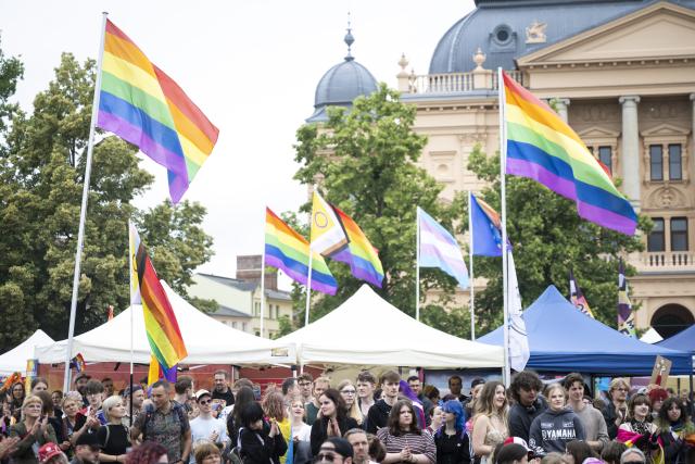 04 July 2026, Mecklenburg-Western Pomerania, Schwerin: Rainbow flags fly on Christopher Street Day. Photo: Philip Dulian/dpa