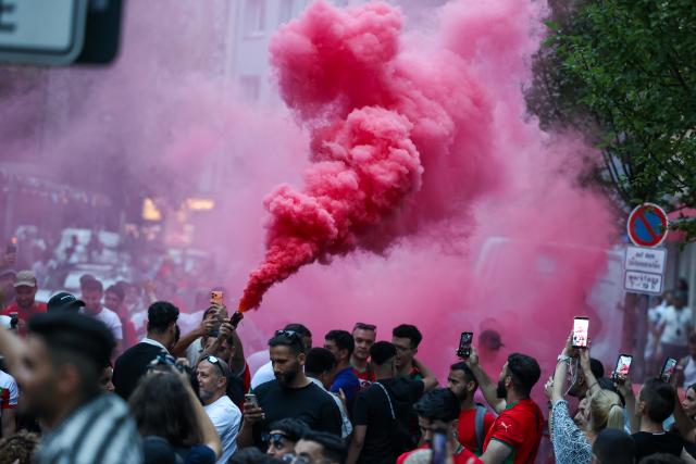 04 July 2026, North Rhine-Westphalia, Duesseldorf: Moroccan fans celebrate after their victory over Canada in the 2026 FIFA World Cup Round of 16 soccer match. Photo: Christoph Reichwein/dpa