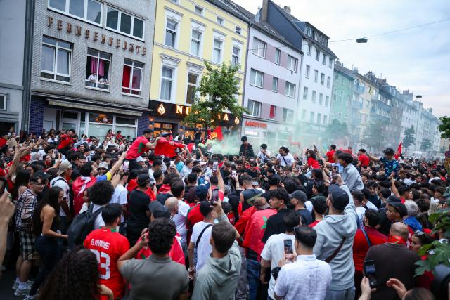 04 July 2026, North Rhine-Westphalia, Duesseldorf: Moroccan fans celebrate after their victory over Canada in the 2026 FIFA World Cup Round of 16 soccer match. Photo: Christoph Reichwein/dpa