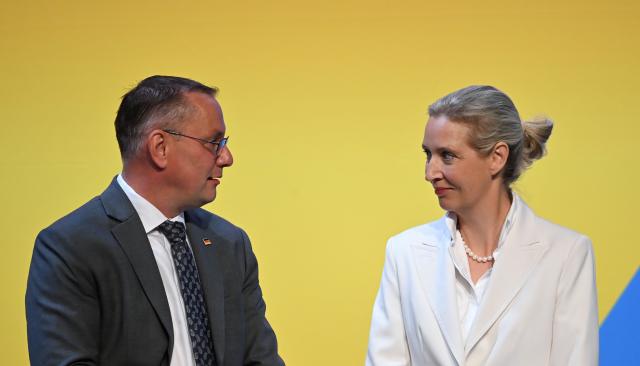 05 July 2026, Thuringia, Erfurt: Tino Chrupalla, co-chairman of the Alternative for Germany party and co-leader of its parliamentary group in the German Bundestag, and Alice Weidel, co-chairwoman of the Alternative for Germany party and co-leader of its parliamentary group in the German Bundestag, attend the second day of the Alternative for Germany national party convention. The convention takes place on 4 and 5 July at the Erfurt Exhibition Centre. Photo: Katharina Kausche/dpa