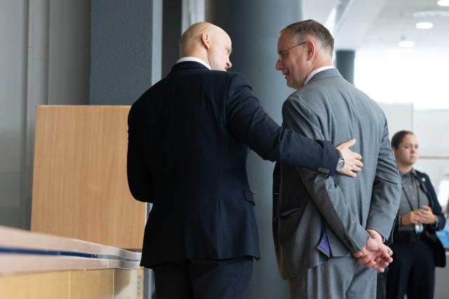 05 July 2026, Thuringia, Erfurt: Andre Wendt (L), second Vice President of the Saxon State Parliament, and Tino Chrupalla, co-chairman of the Alternative for Germany party and co-leader of its parliamentary group in the German Bundestag, stand in the foyer of the Erfurt Exhibition Centre during the Alternative for Germany national party convention. The convention takes place on 4 and 5 July at the Erfurt Exhibition Centre. Photo: Sebastian Kahnert/dpa