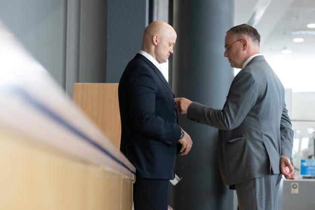 05 July 2026, Thuringia, Erfurt: Andre Wendt (L), second Vice President of the Saxon State Parliament, and Tino Chrupalla, co-chairman of the Alternative for Germany party and co-leader of its parliamentary group in the German Bundestag, stand in the foyer of the Erfurt Exhibition Centre during the Alternative for Germany national party convention. The convention takes place on 4 and 5 July at the Erfurt Exhibition Centre. Photo: Sebastian Kahnert/dpa