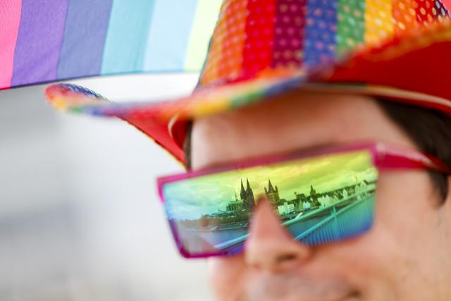 05 July 2026, North Rhine-Westphalia, Cologne: Martin, dressed in a colourful costume, takes part in the Christopher Street Day parade. Photo: Thomas Banneyer/dpa