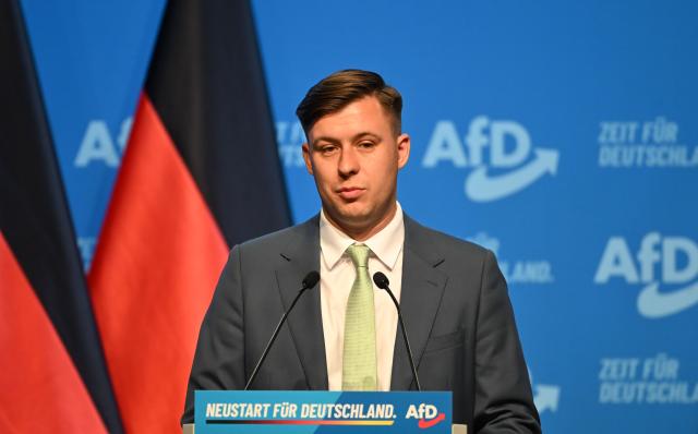 05 July 2026, Thuringia, Erfurt: Jean-Pascal Hohm, head of the AfD's youth organization "Generation Deutschland," attends the second day of the Alternative for Germany national party convention. The convention takes place on 4 and 5 July at the Erfurt Exhibition Centre. Photo: Katharina Kausche/dpa
