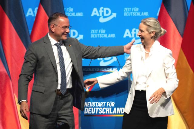 05 July 2026, Thuringia, Erfurt: Tino Chrupalla (L), federal chairman and leader of the Altetnative for Germany (AfD) parliamentary group in the German Parliament (Bundestag), and Alice Weidel, federal chairwoman and leader of the AfD parliamentary group in the Bundestag attend the conclusion of the AfD Federal Party Convention at the Erfurt Exhibition Center. Photo: Sebastian Kahnert/dpa
