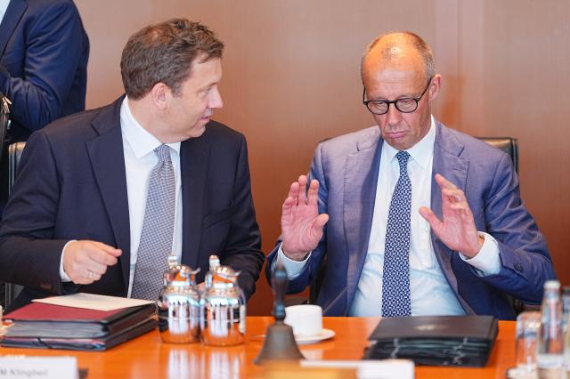 06 July 2026, Berlin: German Chancellor Friedrich Merz (R) and Minister of Finance Lars Klingbeil attend the Federal Cabinet meeting to discuss the planned resolutions regarding the government's draft federal budget for 2027. Photo: Michael Kappeler/dpa