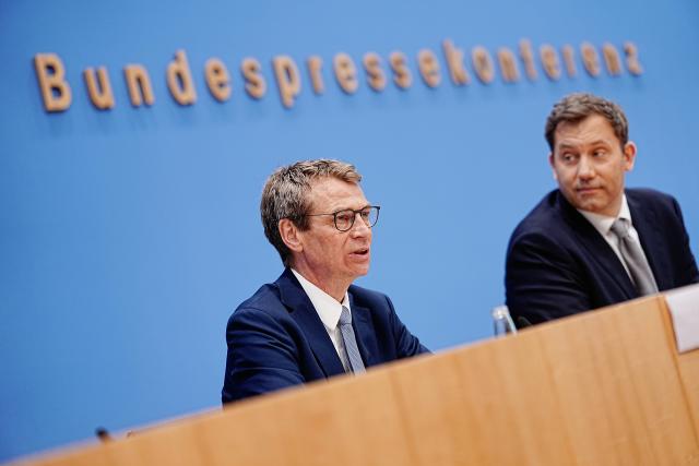 06 July 2026, Berlin: Lars Klingbeil (R), Germany's Minister of Finance, and Steffen Meyer, State Secretary for the Budget at the Federal Ministry of Finance, speak during a press conference to present the draft federal budget for 2027 at the Federal Press Conference Centre. Photo: Michael Kappeler/dpa